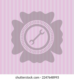 wrench icon inside pink emblem. Concept design. 