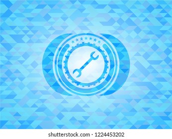wrench icon inside realistic sky blue mosaic emblem