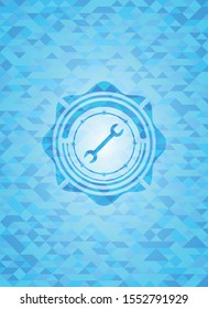 wrench icon inside realistic sky blue mosaic emblem