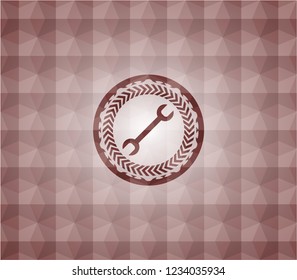 wrench icon inside red badge with geometric background. Seamless.