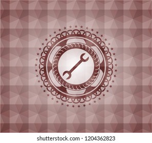 wrench icon inside red emblem or badge with geometric pattern background. Seamless.