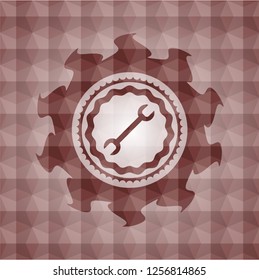 wrench icon inside red seamless polygonal badge.
