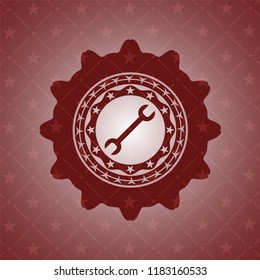 wrench icon inside retro red emblem