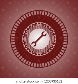wrench icon inside retro style red emblem
