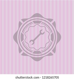 wrench icon inside retro style pink emblem