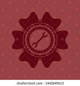 wrench icon inside retro style red emblem