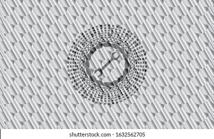 wrench icon inside shiny silver emblem. Scales pattern. Vector Illustration. Detailed.