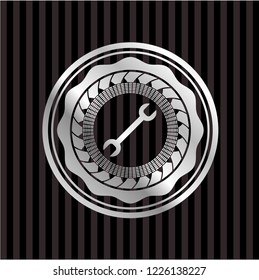 wrench icon inside silver shiny emblem