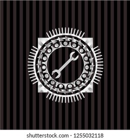 wrench icon inside silver shiny emblem