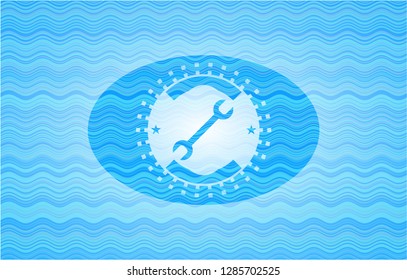wrench icon inside sky blue water wave style emblem.