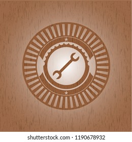 wrench icon inside wood emblem. Vintage.
