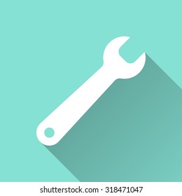 Wrench  icon with long shadow on green background, flat design. Vector illustration.