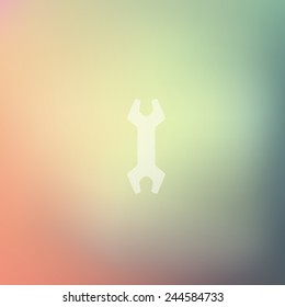 wrench icon on blurred background