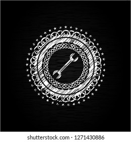wrench icon on chalkboard wrench icon on chalkboard