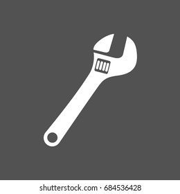 Wrench icon on dark background