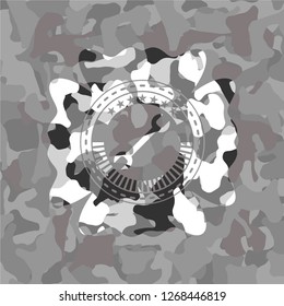 wrench icon on grey camouflage pattern