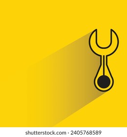 wrench icon with shadow on yellow background