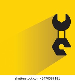 wrench icon with shadow on yellow background