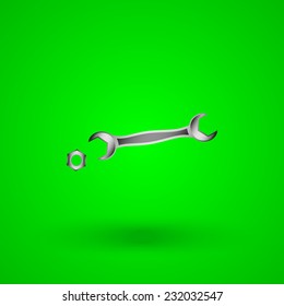 wrench with a nut on a green background