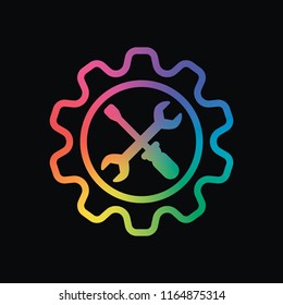 Wrench and screwdriver in gear. Rainbow color and dark background