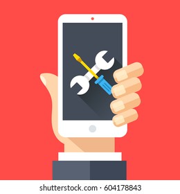 Wrench and screwdriver icon on smartphone screen. Hand holding smartphone. Fix, maintenance, mobile phone repair service concept for web banner, web site, infographics. Flat design vector illustration