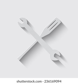 wrench and screwdriver icon with shadow on a grey background