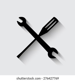 wrench and screwdriver icon   with shadow on a grey background