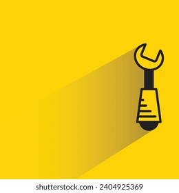 wrench tool icon with shadow on yellow background