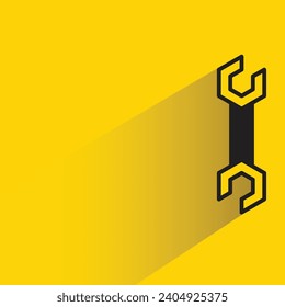 wrench tool icon with shadow on yellow background