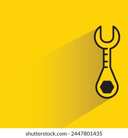 wrench tool icon with shadow on yellow background