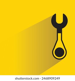 wrench tool icon with shadow on yellow background