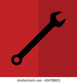 Wrench tool icon vector illustration. Red background