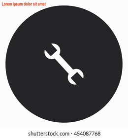 Wrench web icon. Gray circle button with white illustration.