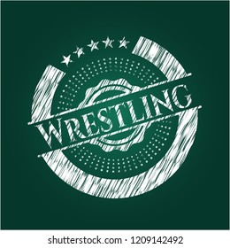 Wrestling chalk emblem written on a blackboard