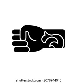 Wrist tattoo black glyph icon. Creating beautiful work on human body. Professional making modern works. Making human arm look unique. Silhouette symbol on white space. Vector isolated illustration
