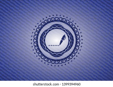 writer icon inside badge with denim background