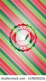 writer icon inside christmas emblem background.