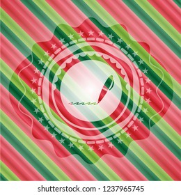 writer icon inside christmas emblem.
