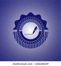 writer icon inside denim background