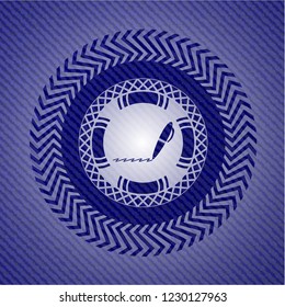writer icon inside emblem with jean texture