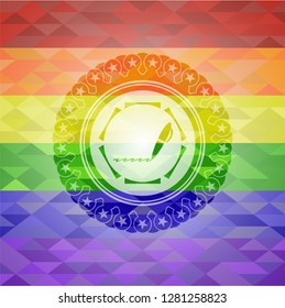 writer icon inside emblem on mosaic background with the colors of the LGBT flag