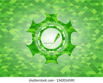 writer icon inside green emblem with triangle mosaic background