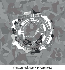 writer icon inside grey camo emblem