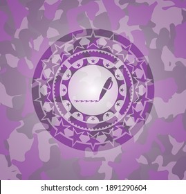 writer icon inside pink and purple camouflage pattern