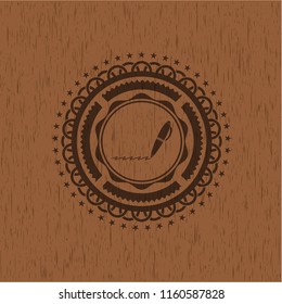 writer icon inside realistic wooden emblem