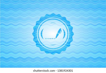 writer icon inside sky blue water wave emblem background.