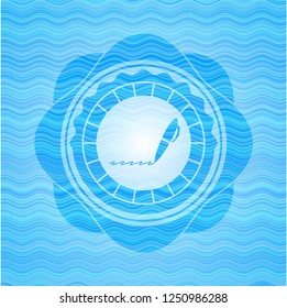 writer icon inside water wave concept badge.