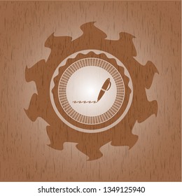 writer icon inside wooden emblem. Vintage.