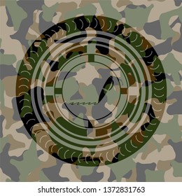 writer icon on camo texture