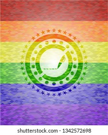 writer icon on mosaic background with the colors of the LGBT flag